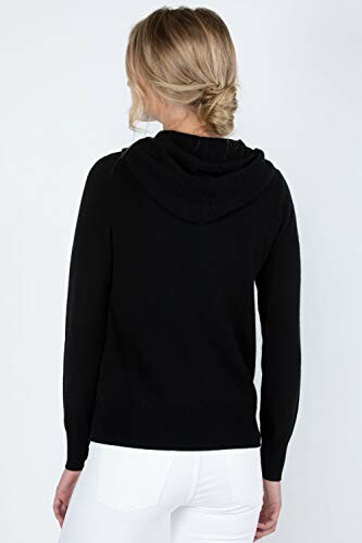 Back view of a woman wearing a black hoodie